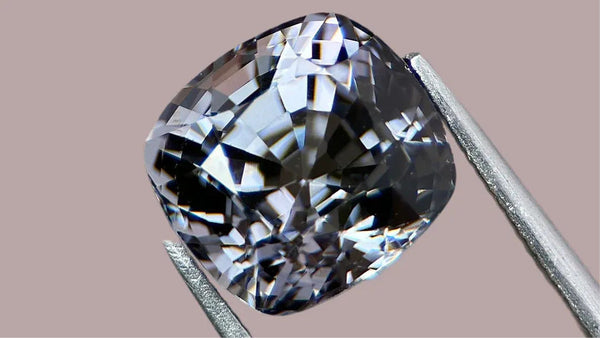 How Light Affects The Appearance Of Grey Spinel Gemstones