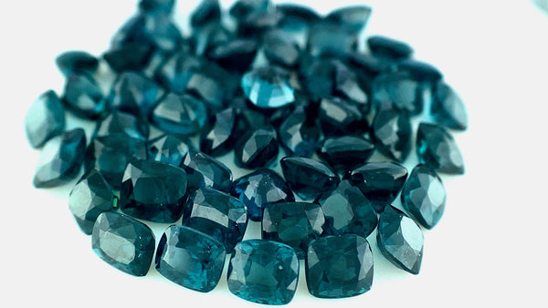 A Set of Teal Green Natural Spinel Parcel.