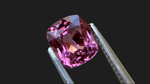 Vivid purple cushion-cut spinel gemstone, ethically sourced from Mogok, perfect for luxury fine jewellery and durable enough for everyday wear, supplied by a UK-based direct source.