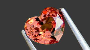 Rare 1-carat pastel orange heart-shaped spinel from Myanmar, perfect for gemstone collectors and one-of-a-kind bespoke jewellery pieces. Ethically sourced and natural.