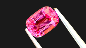 Vivid pink cushion-cut natural spinel gemstone, offering affordable luxury. This vibrant gemstone is perfect for everyday elegance and custom jewellery designs.