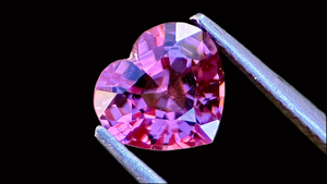 Exquisite heart-shaped pink natural spinel gemstone with brilliant sparkle, ideal for fine bespoke jewellery designs, ethically sourced and hand-cut.