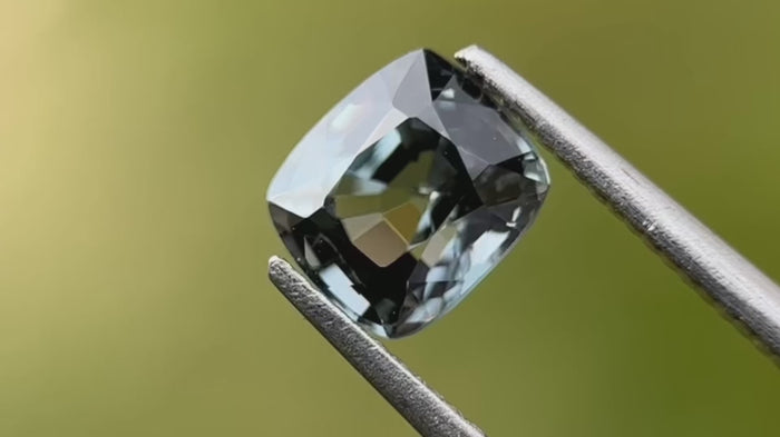 Video showcasing an intense green natural spinel with eye-clean clarity. Features its rare colour and unique attributes, perfect for bespoke engagement rings. Sourced from Mogok, Myanmar.