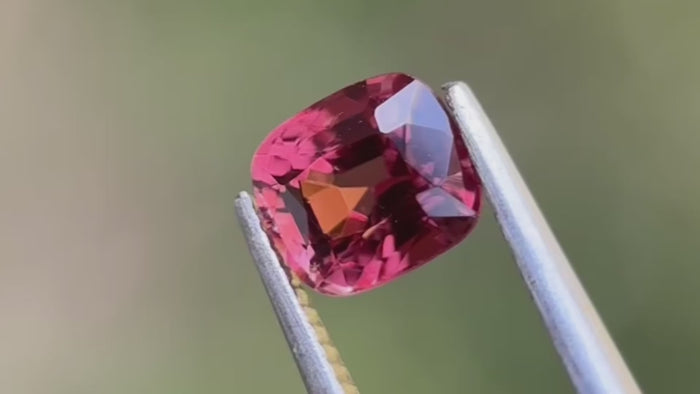 Burma-origin vivid pinkish-red cushion-cut gemstone, perfect for creating eye-catching jewellery.