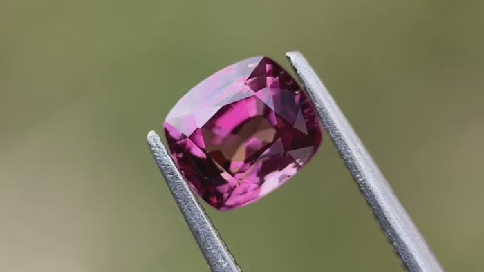 Video showcasing a 1.22-carat purple natural spinel gemstone. Highlights its unique characteristics and vibrant colour, ideal for one-of-a-kind engagement rings. Sourced from Mogok, Myanmar.