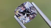 Unique greenish-grey cushion-cut natural spinel gemstone from Myanmar, captured in natural daylight to highlight its distinct colour and brilliance. Ideal for custom fine jewellery and engagement rings.