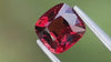 Cushion-cut red natural spinel, Mogok origin, showcasing its vibrant colour and brilliance, ideal for custom fine jewellery.