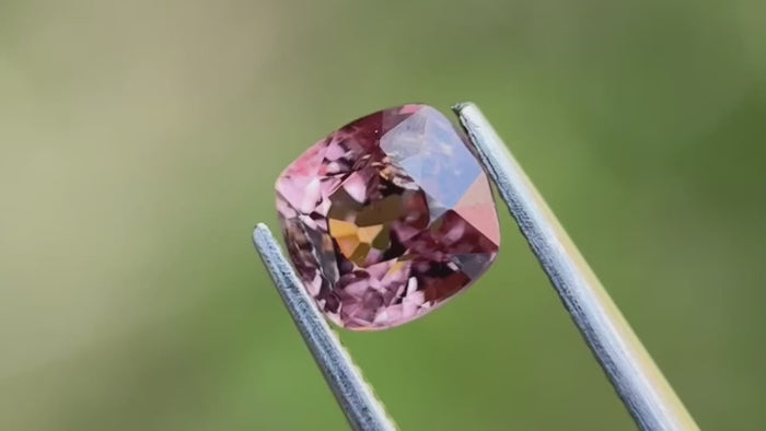 Vivid brown cushion-cut natural gemstone from Myanmar, supplied by a UK-based supplier.