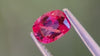 0.50ct Reddish-Pink natural spinel with visible inclusions from Mogok, Myanmar, hand-cut for unique jewellery designs.
