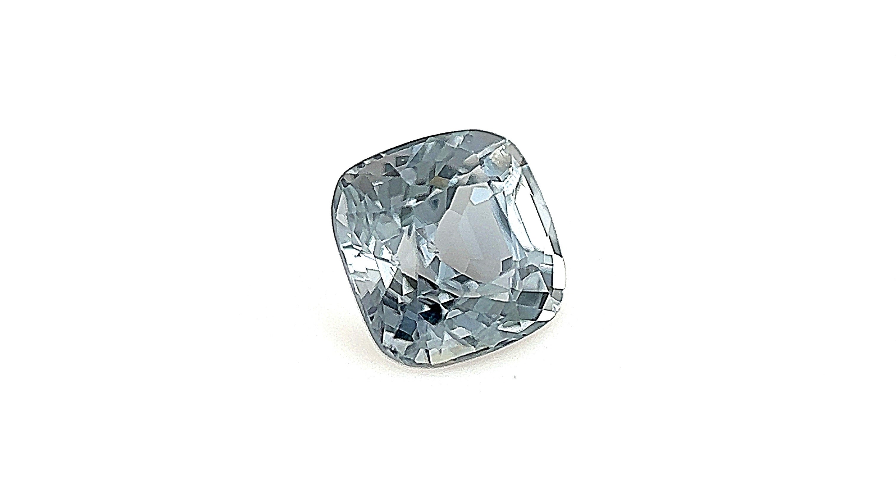 Silver Greenish-Grey Eye Clean Clarity Natural Spinel 0.90ct  under artificial light