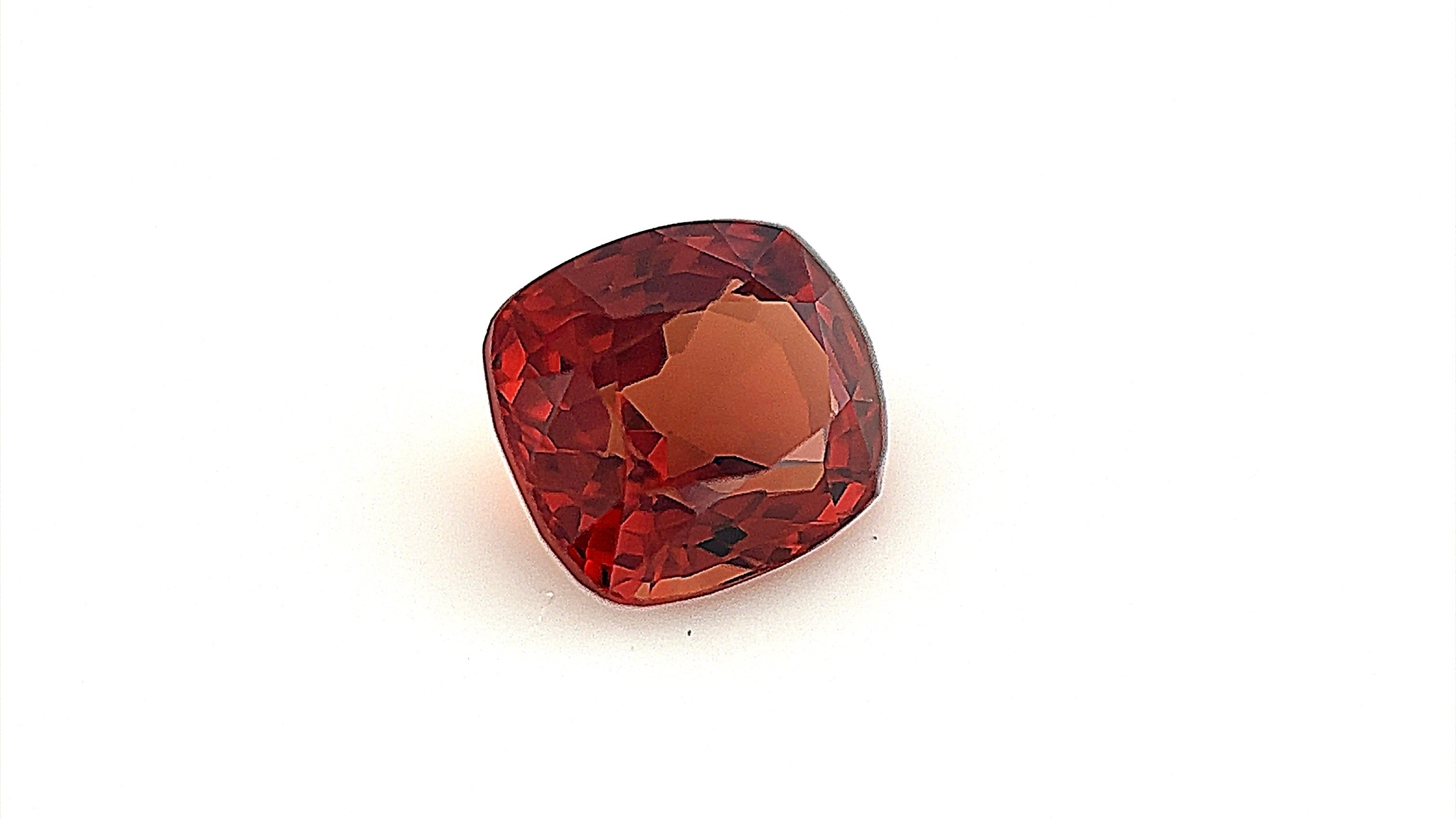 Red-orange natural spinel gemstone, renowned for its vibrant colour and brilliance. Ideal for fine jewellery and bespoke designs, sourced from Mogok, Myanmar.