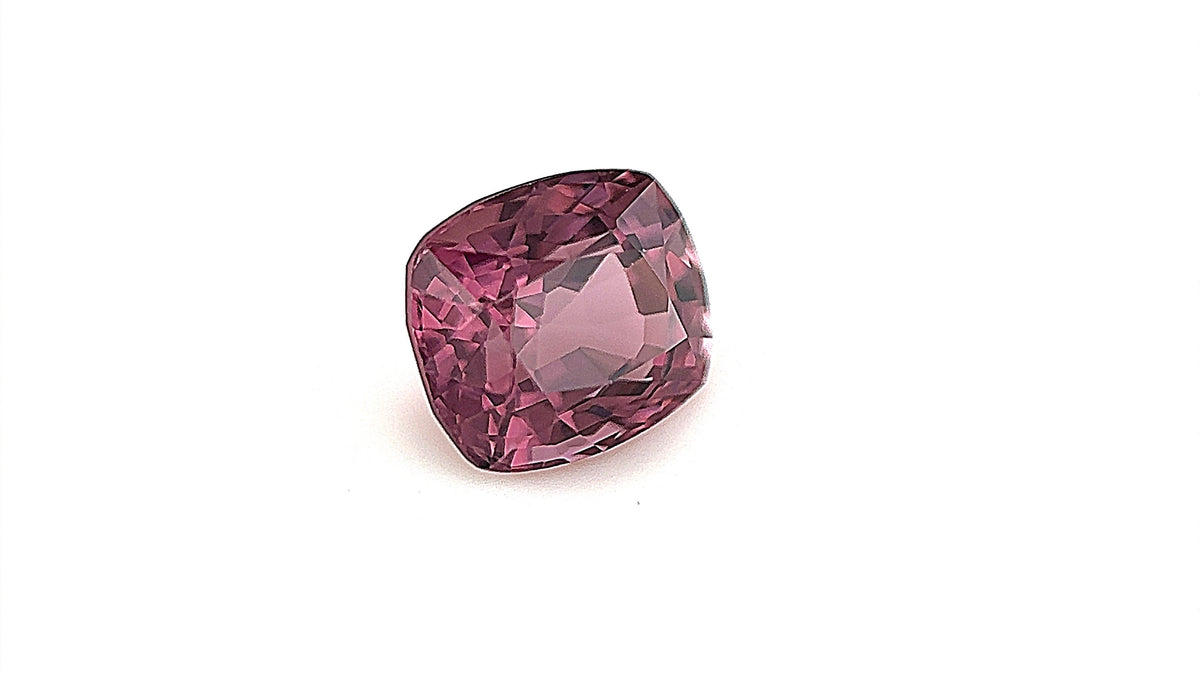 Vivid purple cushion-cut natural spinel gemstone from Myanmar, photographed with gemlight box. Ideal for bespoke engagement ring. 