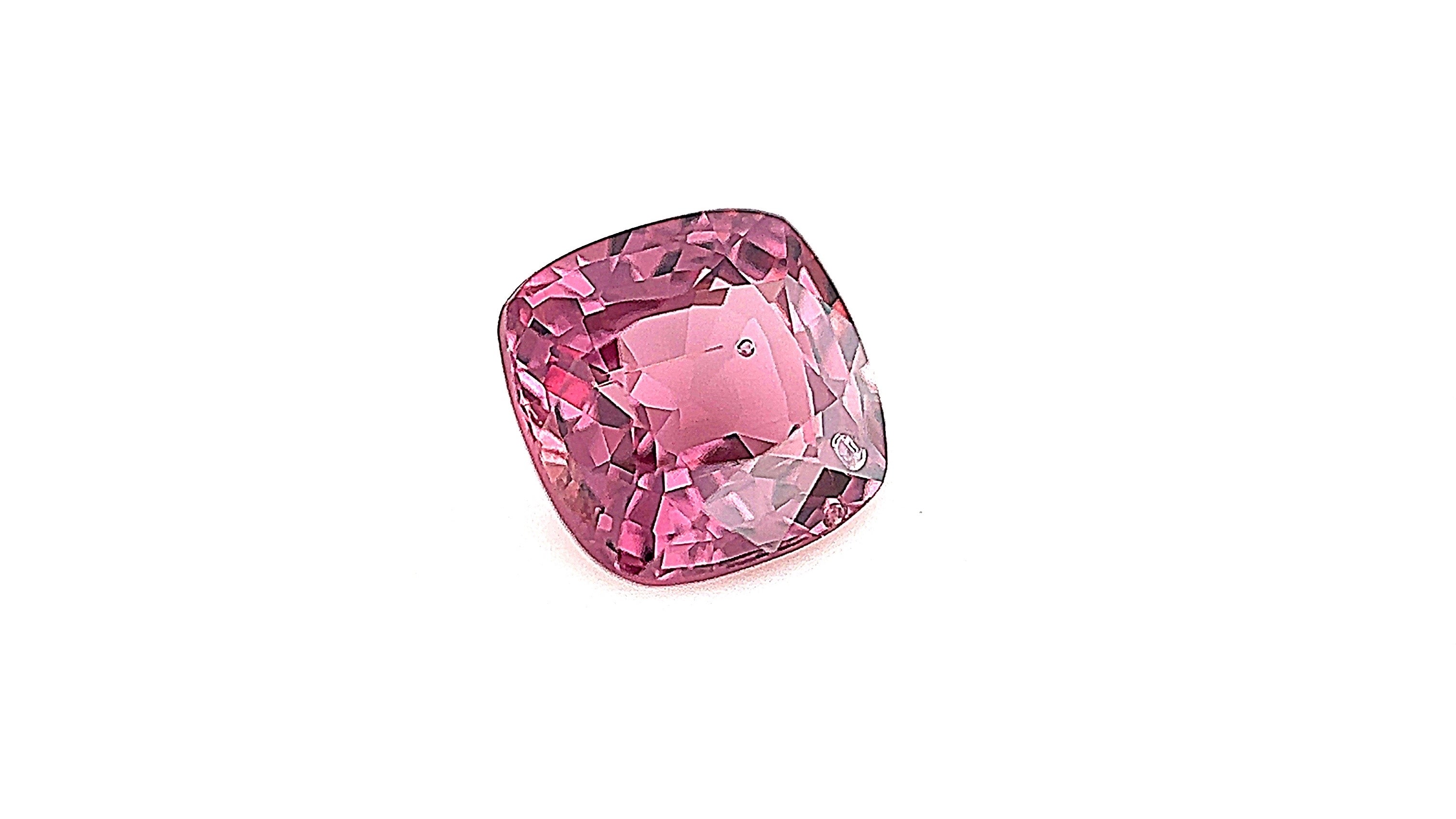 Ethically sourced Burma gemstone, pink natural untreated spinel, durable August birthstone, captured indoors with gemlight box lighting. Perfect for high-quality bespoke jewellery.